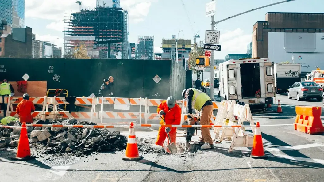 A road crew working a live traffic corridor